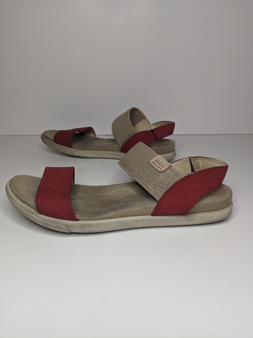 Ecco red leather ankle strap sandals with beige elastic bands.